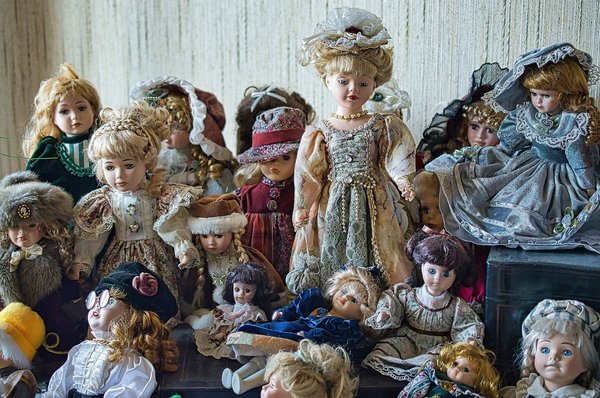 How to ensure the safe transport of a collection of antique dolls during a UK move?